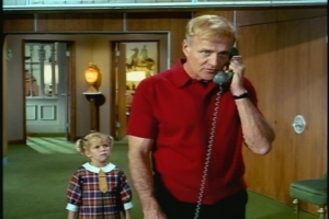 Here he is canceling his bowling plans, explaining to his friend that he's "stuck with the kids." Ouch. Well, he didn't know Buffy was behind him.